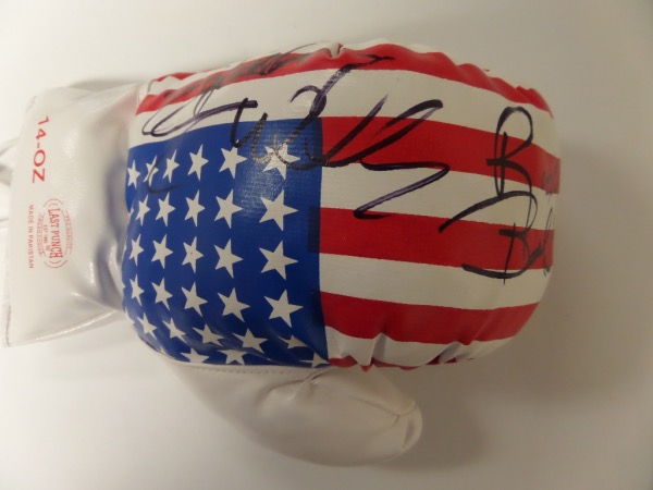 This 14 ounce USA flag-style glove has laces and is mint! It comes signed perfectly by this aging legend in black with his character name "Rocky Balboa" included!  Perfect for display and retails in the high hundreds/low thousands. Guaranteed authentic. 