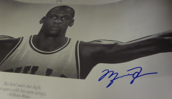 This absolutely HUGE poster measures 21x60, and is an image of Michael Jordan's long wingspan.  It is hand-signed in bold blue sharpie by the 6x champion and "Last Dance" star himself, grading about an 8 overall, and comes fully PSA/DNA certified (AG 06128) for authenticity purposes.  An imposing piece to add to any collection, assuming you have the room, and retail is easily into the thousands!