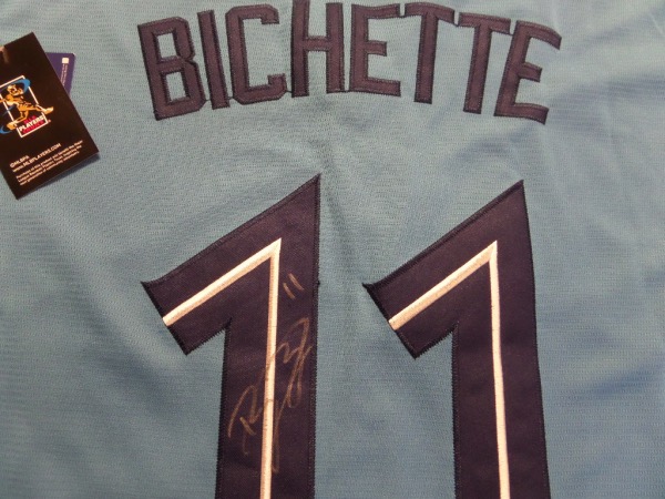 This mint & authentic blue Toronto jersey has sewn on everything and comes signed on the back numbers by this young star in silver with his #11 included. Guaranteed authentic and only rising in value as Toronto is loaded and going places and Bo might soon be an MVP!  