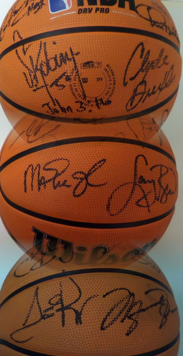 This full size Wilson NBA basketball is in NM condition, and comes black sharpie signed by the greatest hoops team ever assembled.  Included are Stockton, Malone, Drexler, Ewing, Robinson, Jordan, Johnson, Barkley, Bird, Mullin, Pippen, and Laettner, and this awesome NBA item will show off proudly in any basketball collection!