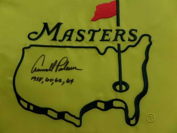 This MINT yellow Masters logo pin flag comes hand-signed in black sharpie by all time PGA great, Arnold Palmer.  The signature grades a legible 8, including the 4 years that he won the major event, and this baby will frame and display proudly in any golf collection.  With Palmer no longer living, retail is high hundreds!