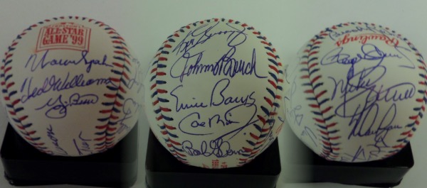 This Official 1999 All Star Game baseball from Rawlings is cubed in NM condition, and is laced in red and blue.  It comes hand-signed all over in blue ink by 19 members of the famed All Century Team, chosen in 1999.  Included are Hank Aaron and Willie Mays (ss), Clemens, McGwire, Ripken, Banks, Berra, Griffey, Spahn, Schmidt, Bench, Williams, Koufax, Scully, Musial, Rose, B. Robinson, Gibson and Ryan.  A stunning baseball with so many all time greats, and with 8 now deceased, retail is low thousands!!!