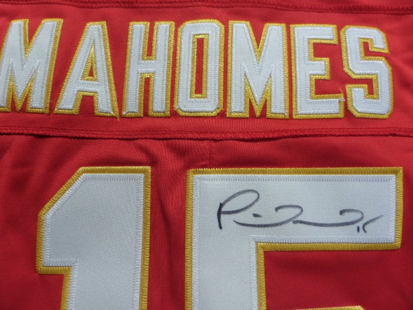 This mint authentic bright red Chiefs jersey comes signed by this future HOFer on his back numbers with his #15 included.  Chiefs are favored for yet another run next year after winning it AGAIN this year and this jersey shows off wonderfully and is guaranteed authentic. HIGH retail 