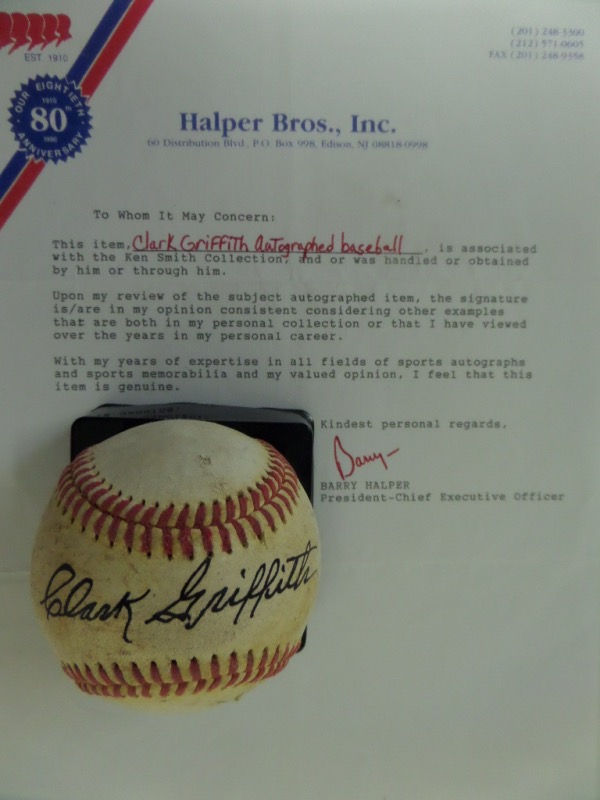 This vintage red-laced baseball is in G+ overall condition, and comes hand-signed in black ink across the sweet spot by HOF Senators pitcher/manager, Clark Griffith.  The signature grades a clean, overall 7, and the ball includes a full Halper Bros. LOA for authenticity purposes.  Valued into the low thousands!