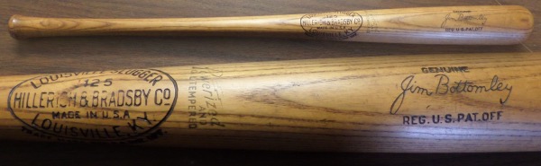 This 33.5" long wooden Louisville Slugger 125 bat from Hillerich & Bradsby is a pro model/game issue bat that comes to us in EX+ overall condition.  It is a Jimm Bottomley signature model and shows minor use but zero chipping or cracking, and will make for an outstanding addition to your vintage baseball collection!