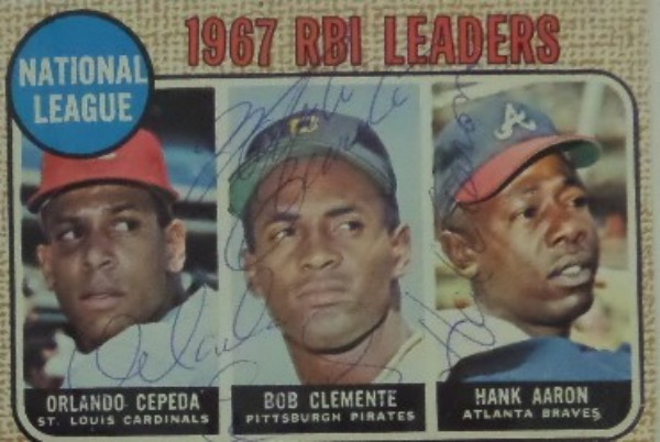 This 1968 Topps #3 "RBI Leaders" baseball card is in EX condition, and comes autographed on the surface by all three HOF players pictured.  Included are Orlando Cepeda, Roberto Clemente and Hank Aaron, and with all three signatures present, this card books into the mid/high hundreds!