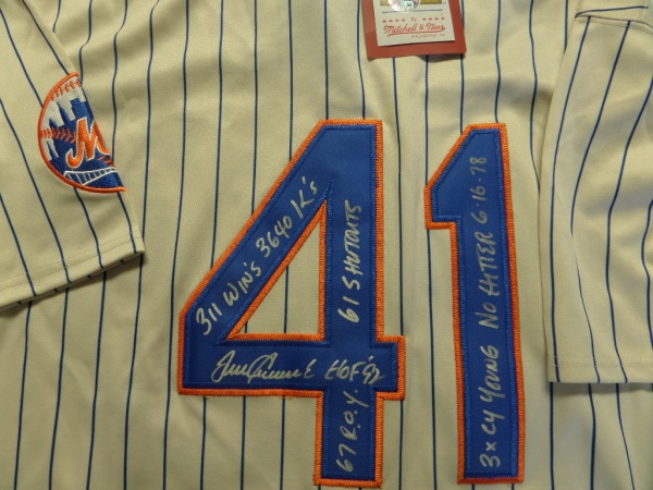 This mint REAL Mitchell & Ness jersey is tagged right from 1969, has sewn on everything and comes IN PERSON, back #41 signed by the amazing, deceased HOF pitcher. It grades a 12 on a 1-10 scale, has tons of added career stats from "Tom Terrific", and shows off EZ from 30 feet away! Lee approved, and simply amazing, like the 69 Mets were. 