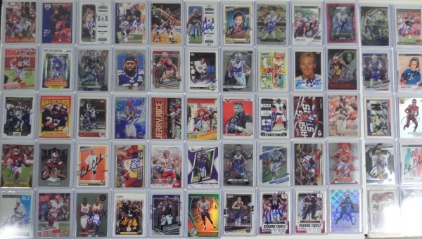 This ENORMOUS group lot is SIXTY sports trading cards, and each one is hand-signed by the star player/HOF'er shown!  HUGE names here, with a few deceased, and a ton of superstar and HOF names like Kelce, St. Brown, Hurts, Gretzky, Jordan, Metcalf, F. Harris (dec), Rice, Antetokounmpo, B. Jackson, Dr. J, C. Clark, Barkley, Seau (dec), Moss, K. Thompson, Roethlisberger, Shaq, Mahomes, L. Jackson, Jefferson, Lamb, Edwards, Jokic, J. Allen, Rose (dec), E. Campbell (dec), Burrow, Love, Young/Rice together, and more.  AWESOME lot of signed cards here, and retail is well into the four figure range!!!