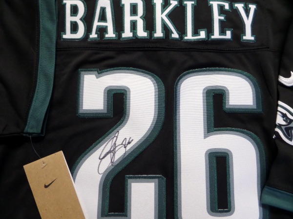 This mint authentic black Eagles jersey comes signed by the newest Eagles RB superbly on his back numbers with #26 included!  Great jersey from this All-Pro and retail is shooting up fast as Philly just won the Super Bowl as I am typing this in!  Guaranteed authentic and Saquon having monster year and broke 2k rushing yards!
