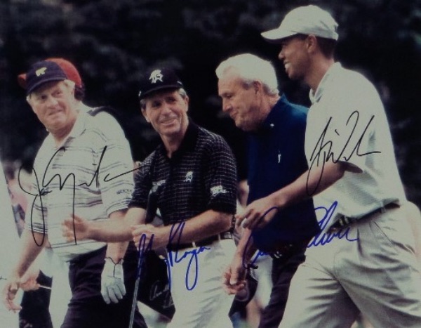 This full color 8x10 shows four of the greatest to ever do it walking a course in the late 1990's.  It is hand-signed by all four, with Jack Nicklaus and Tiger Woods both in black sharpie, and Arnold Palmer and Gary Player both in blue, and retail is high hundreds all day long on this collector's dream!  Legendary Icons COA included!