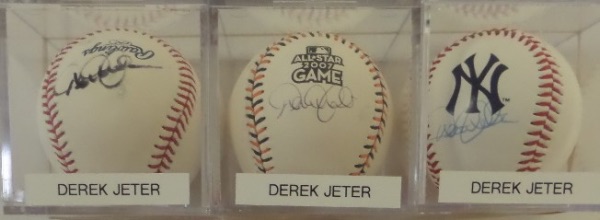 This wonderful collector's lot is THREE different Rawlings baseballs, and each one is hand-signed by Yankees HOF great, Derek Jeter.  Included are a 2007 All Star Game Ball, signed in blue ink, a NY logo n/o ball, signed in blue flair, and an Official ML ball, signed in black sharpie.  All balls are cubed in NM condition, and all signatures are on a side panel, with each ball booking at about $500!
