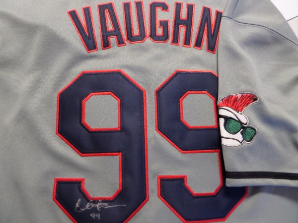 This custom-made road gray Cleveland Indians #99 Vaughn jersey commemorates the wacky character created by Charlie Sheen for the 1989 comedy classic, "Major League."  It is in NM condition, has everything sewn, and is back number-signed in silver by the controversial actor himself.  Ideal for any baseball or Hollywood collection, and retail is high hundreds!