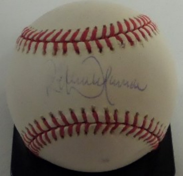This Official American League Baseball from Rawlings is in EX shape, and comes hand signed across the sweet spot in blue ink by 4 time Cy Young winner and HOF lefty, Randy Johnson.  The signature grades about a 5.5-6 overall, and the ball is affixed with a sticker from JSA (CD18180) for authenticity purposes.  Valued well into the hundreds!