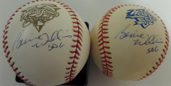 This fabulous Yankees collector's lot is TWO different Rawlings Official World Series Baseballs, one a 1999 WS ball that is in VG+ shape, and the other a 2000 WS ball that is EX/MT.  Both balls are side panel-signed beneath the WS logo and in blue ink by longtime Yankees centerfielder, Bernie Williams, and each can retail into the hundreds by itself!