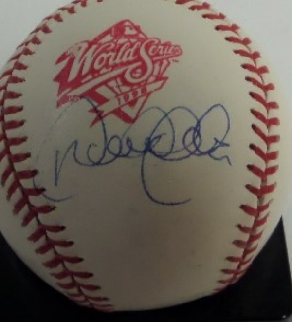 This Official 1998 World Series Baseball from Rawlings is in EX condition, and comes side panel-signed in blue ink by Mr. November, HOF shortstop Derek Jeter.  The signature grades about an 8, and with this opportunity in our May 30 Auction, well, let's just say you don't have to prostrate yourself to Derek to attain a signed ball!