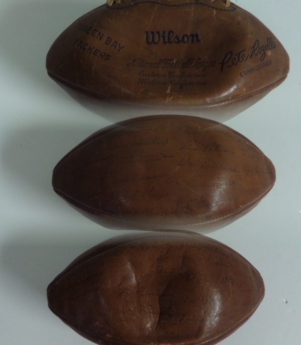 This vintage "the Duke" official ball has Pete Rozelle as the Commish and "GREEN BAY PACKERS" stamped on the Wilson ball.  The ball is just slightly deflated and shows it age, but has been signed in black inks by the entire team that was loaded with HOFers!  The signatures are all faded, but mostly legible and included are LOMBARDI, FEARS, NITSCHKE, D.ROBINSON, KRAMER,GREGG,STARR, TAYLOR,ADDERLEY, WOOD, HORNUNG,ETC..Comes with a COA from Joe Dimaggio Estate for authenticity purposes. WOW