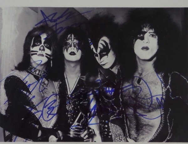 This black and white 8.5x11 photo shows all four members of HOF hard rock band Kiss during their mega popular 1970's heyday.  It is hand-signed in blue sharpie by all four rock icons, including Peter Criss, Ace Frehley, Gene Simmons and Paul Stanley, and a retail potential of high hundreds is certainly a distinct possibility here!