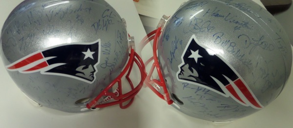 This full size, replica style New England Patriots helmet from Riddell comes hand signed in blue sharpie by more than 35 members of this Super Bowl Champion squad!  Included are Belichick, Brady, Bruschi, SB MVP Branch, Harrison, Vinatieri, and many more, and this gorgeous display helmet books into the very high hundreds!